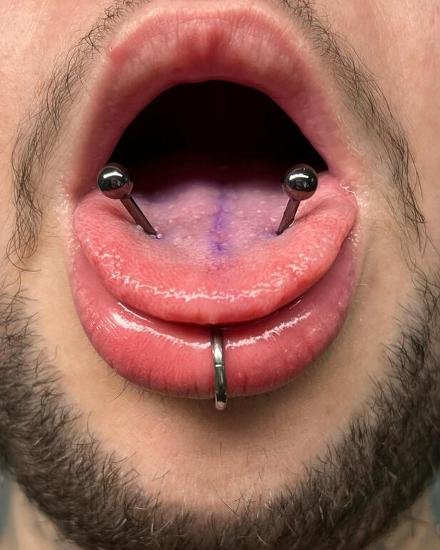 Paired tongue piercing
